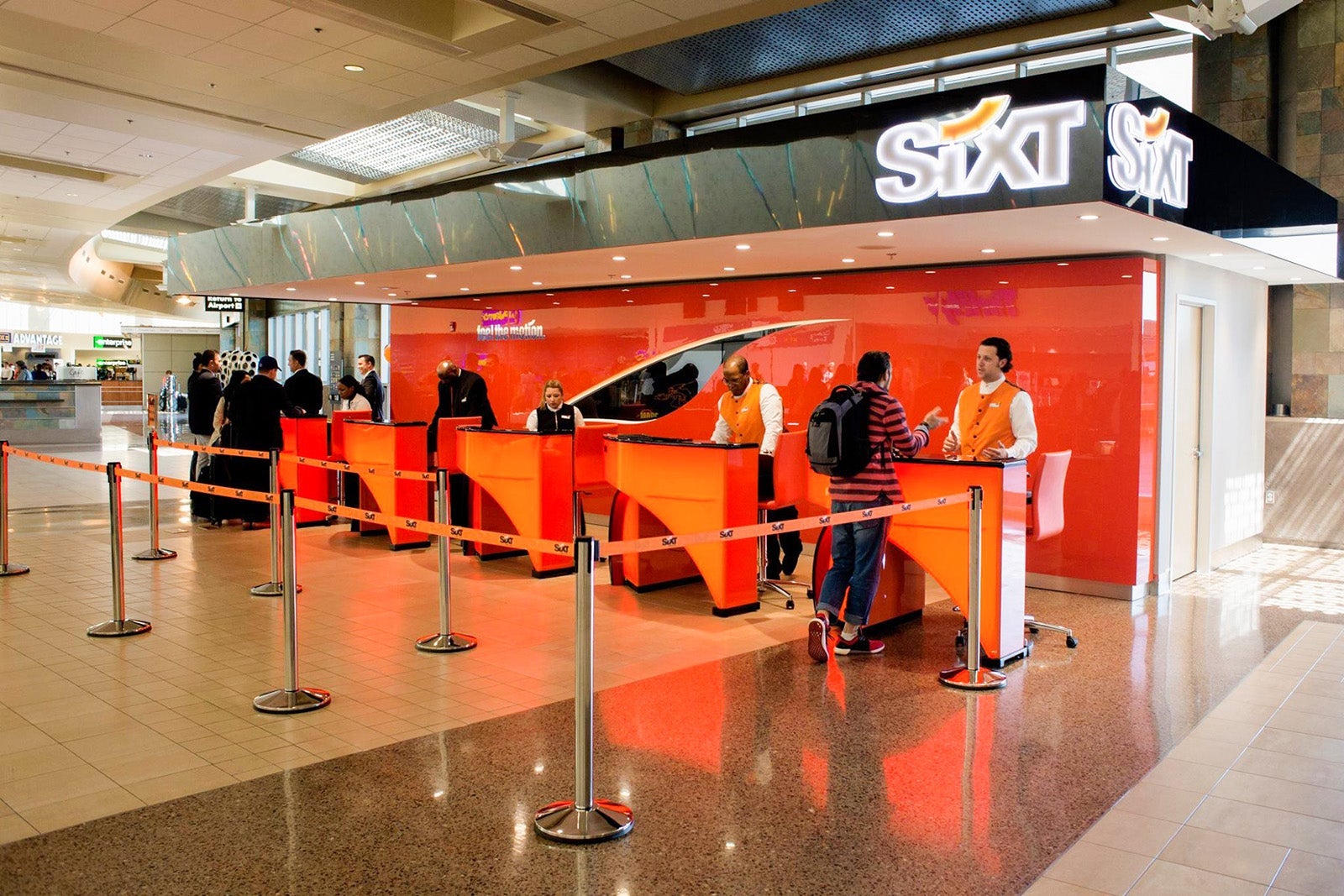 orange Sixt counter in airport