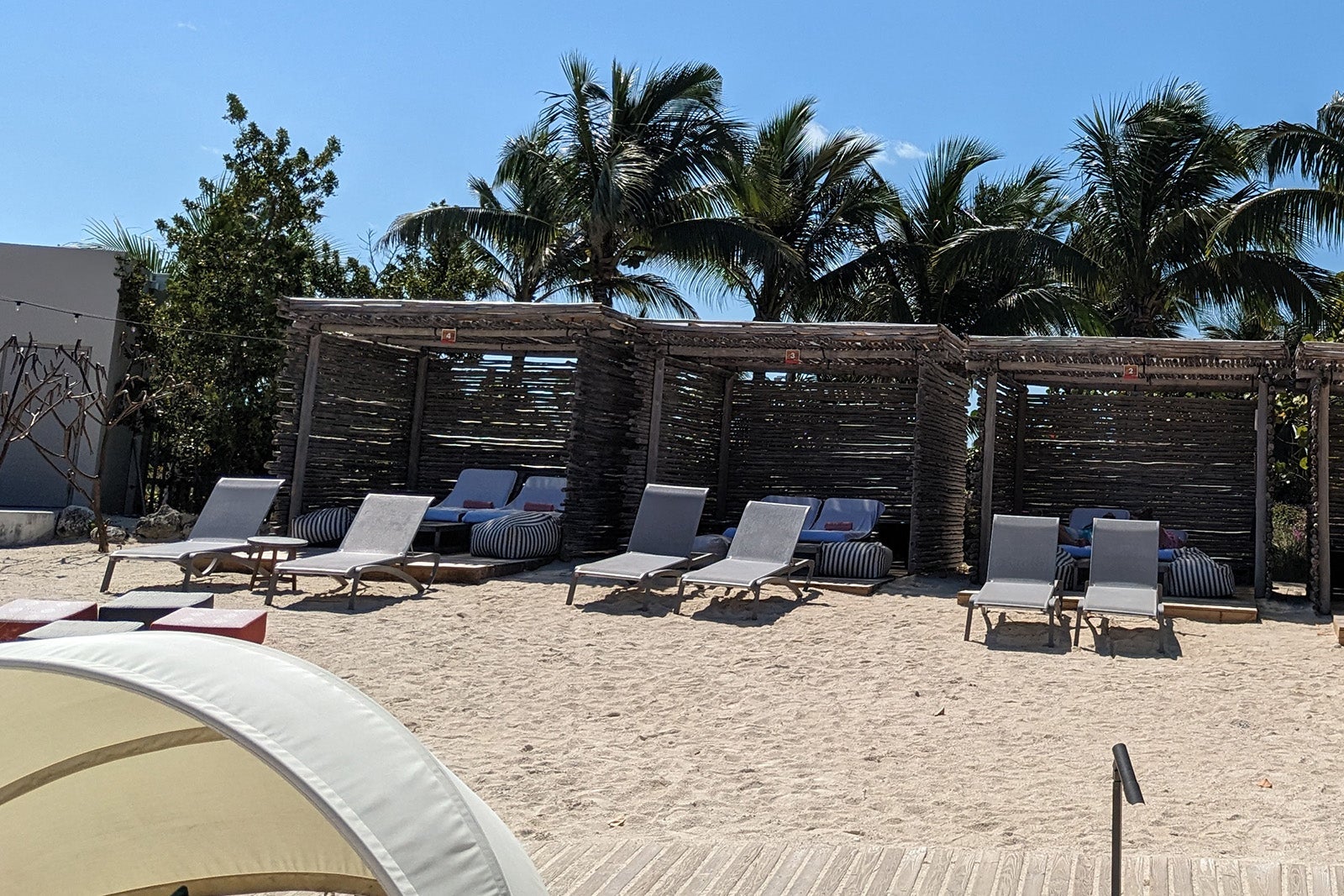 Thatched-roof beach cabanas