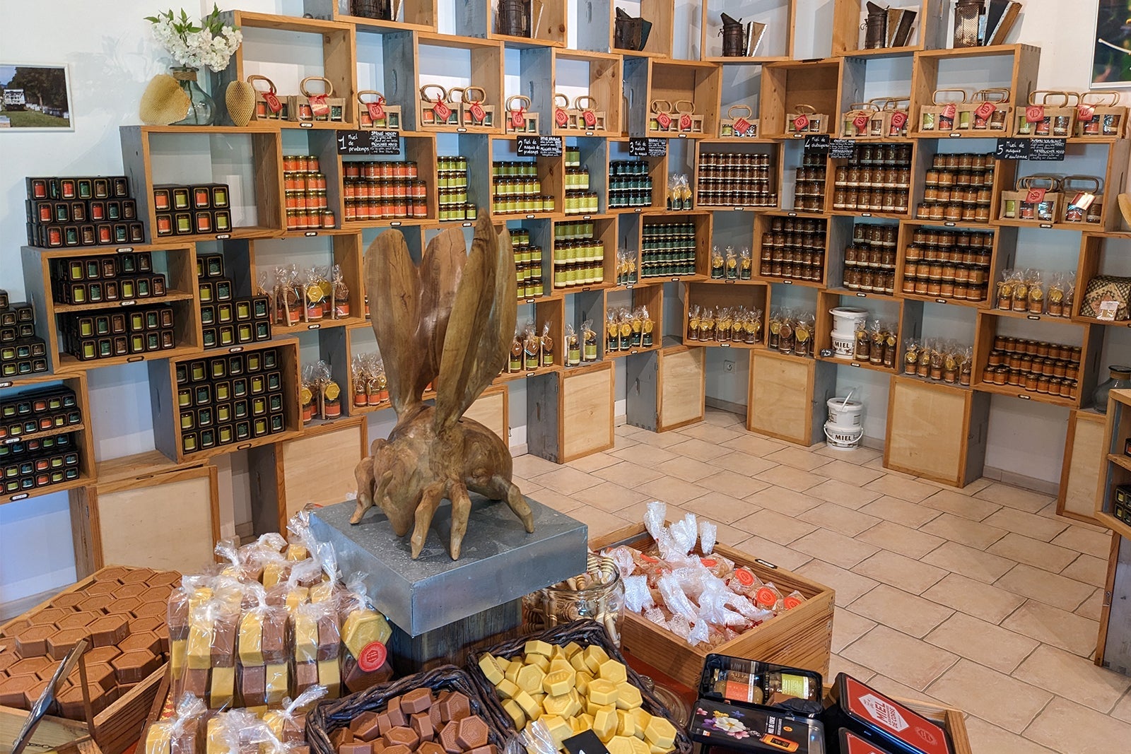 Shop selling jars of honey, plus honeycomb-shaped soaps.