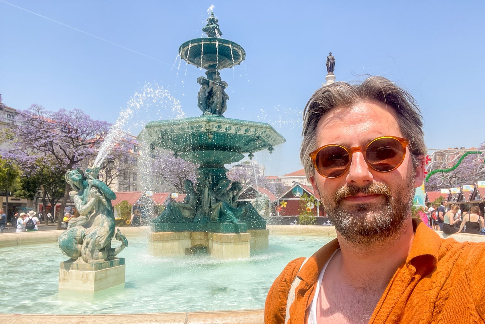 Rossio Square's beautiful fountain and market.