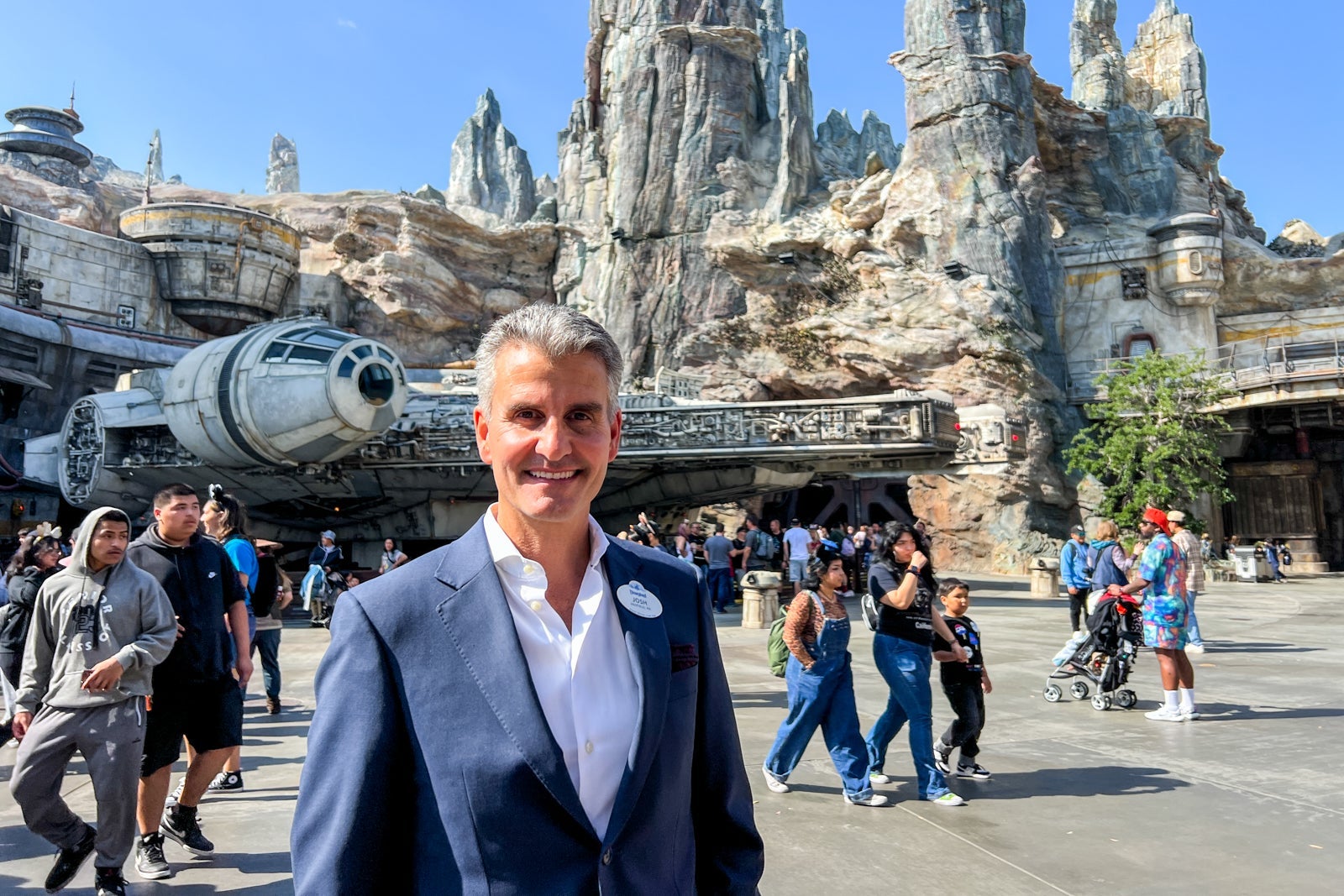 Josh D’Amaro, the chairman of Disney parks, experiences and products, stands in Disneyland overlooking the Star Wars: Galaxy's Edge.