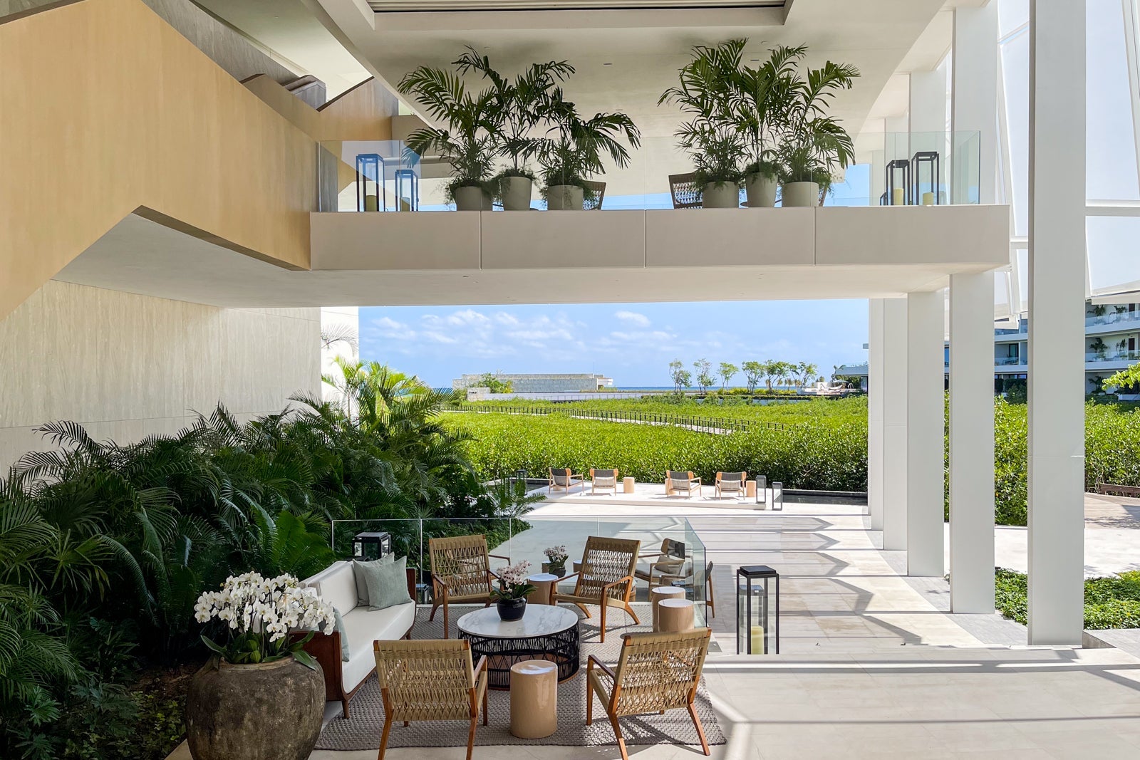 Shaded outdoor seating at The St. Regis Kanai Resort, Riviera Maya