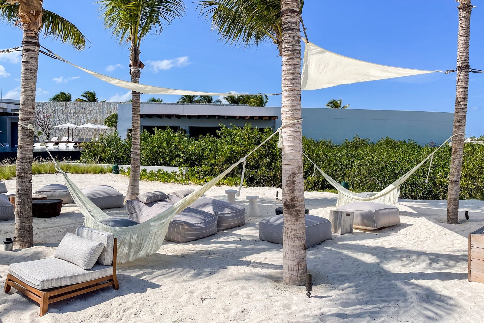 Shaded beach seating. St. Regis Kanai Resort, Riviera Maya