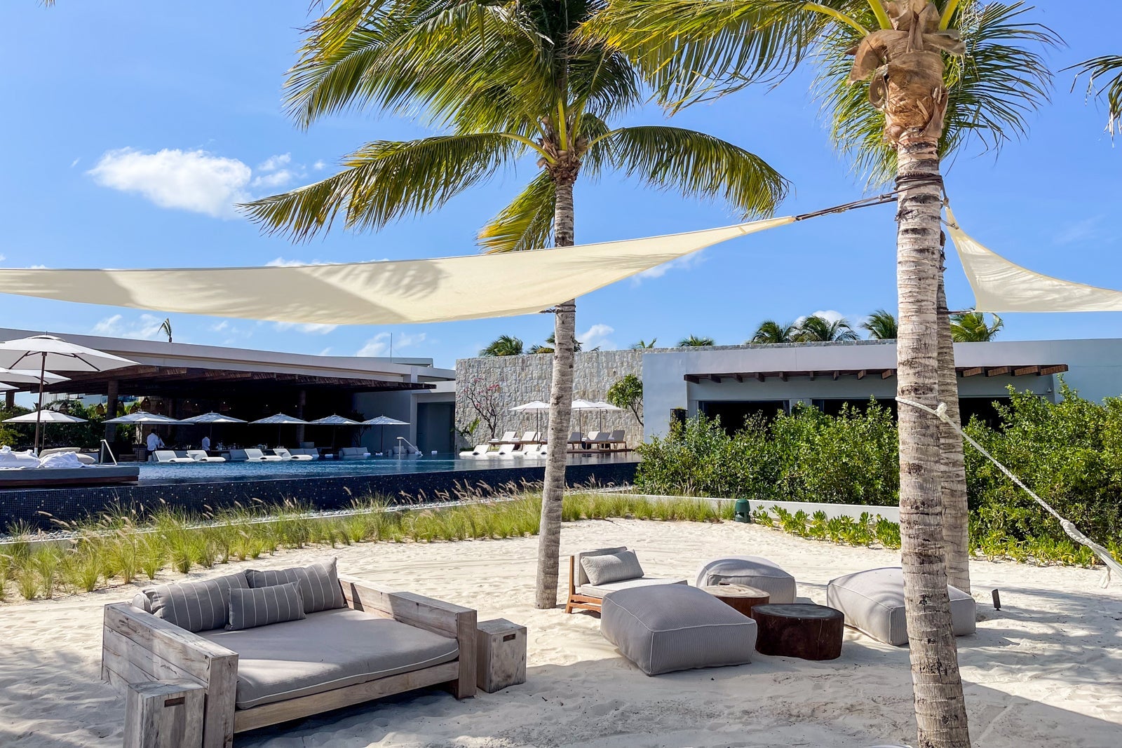 Shaded beach seating. St. Regis Kanai Resort, Riviera Maya