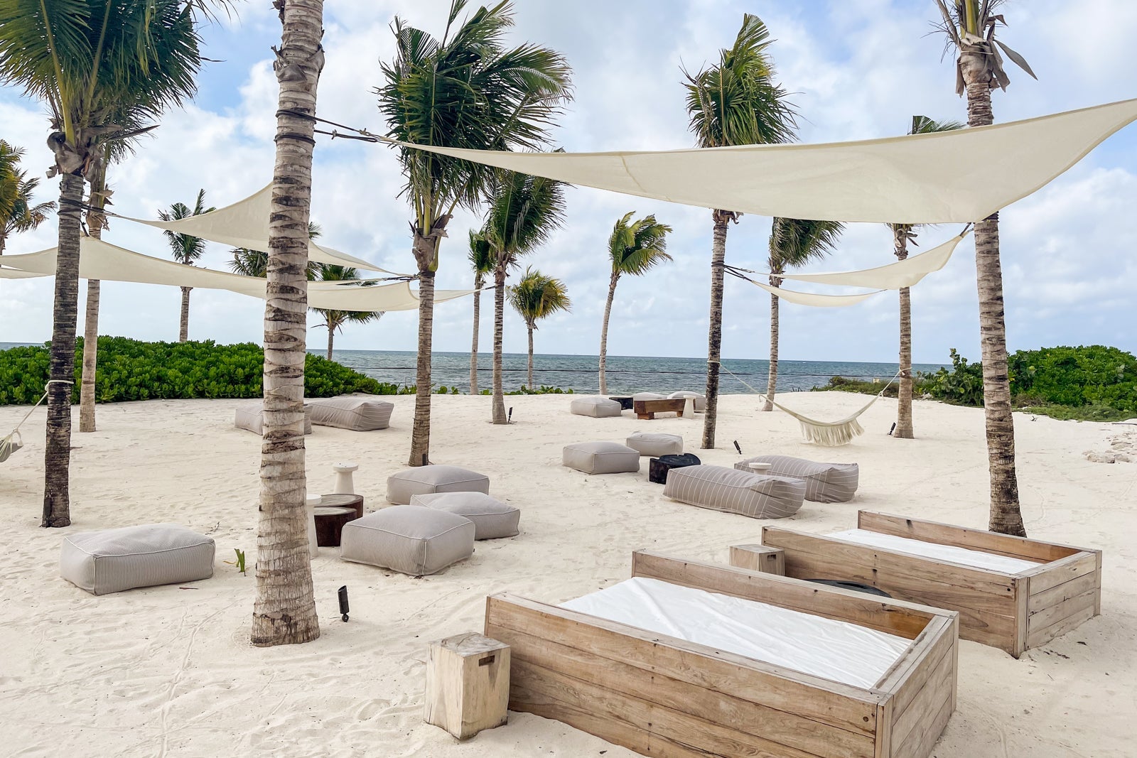 Fun and shaded seating at the beach. St. Regis Kanai Resort, Riviera Maya