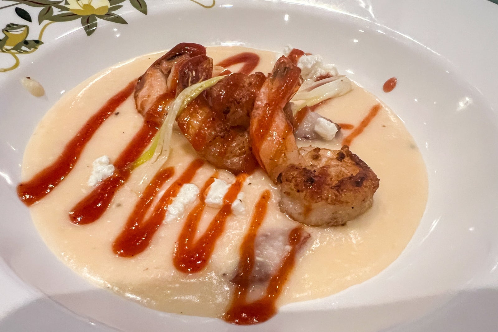 Plate of shrimp and grits at Tiana's