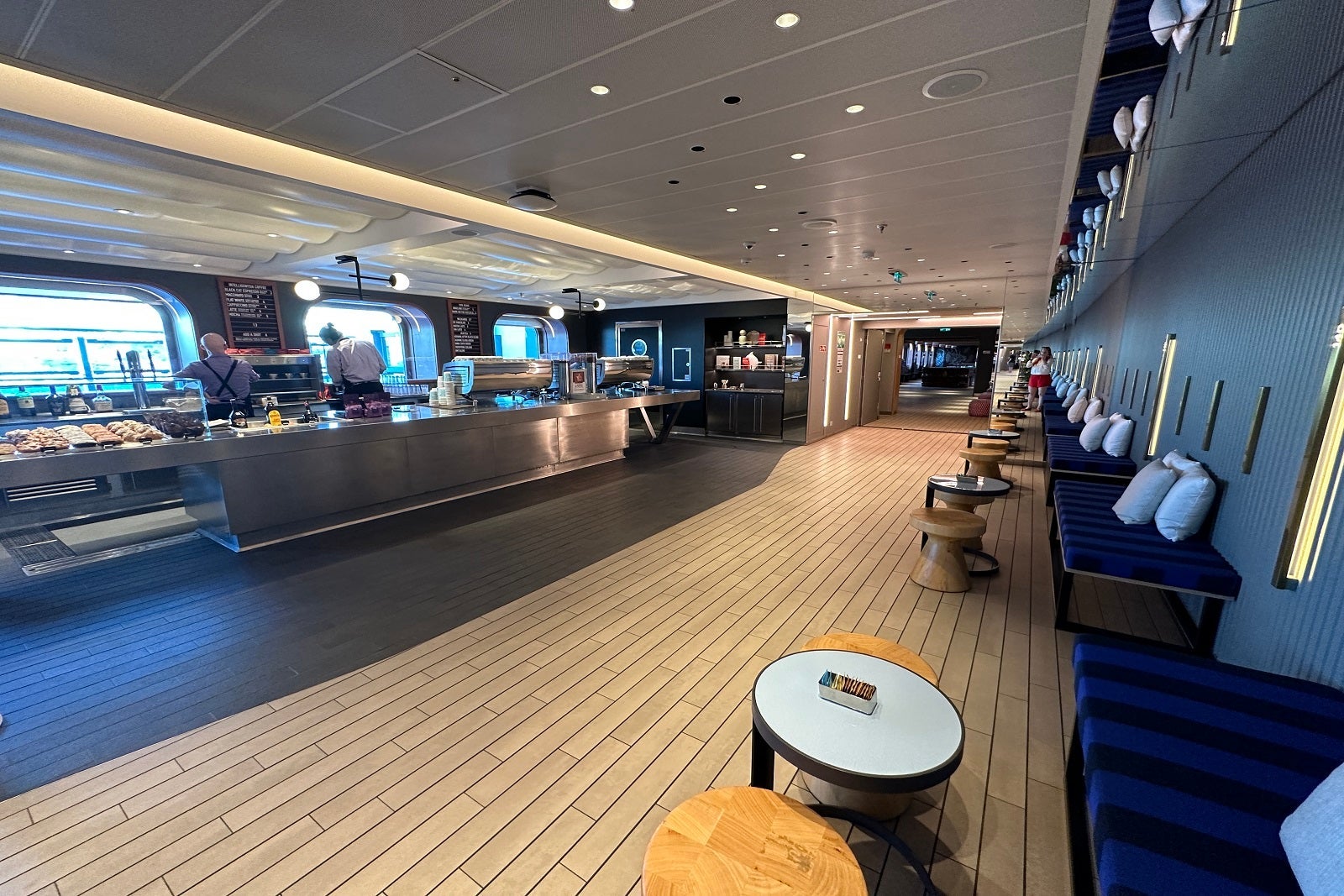 A coffe bar cafe and seating area on a cruise ship