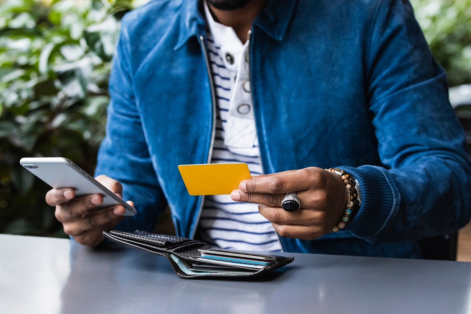 Woman paying with her card