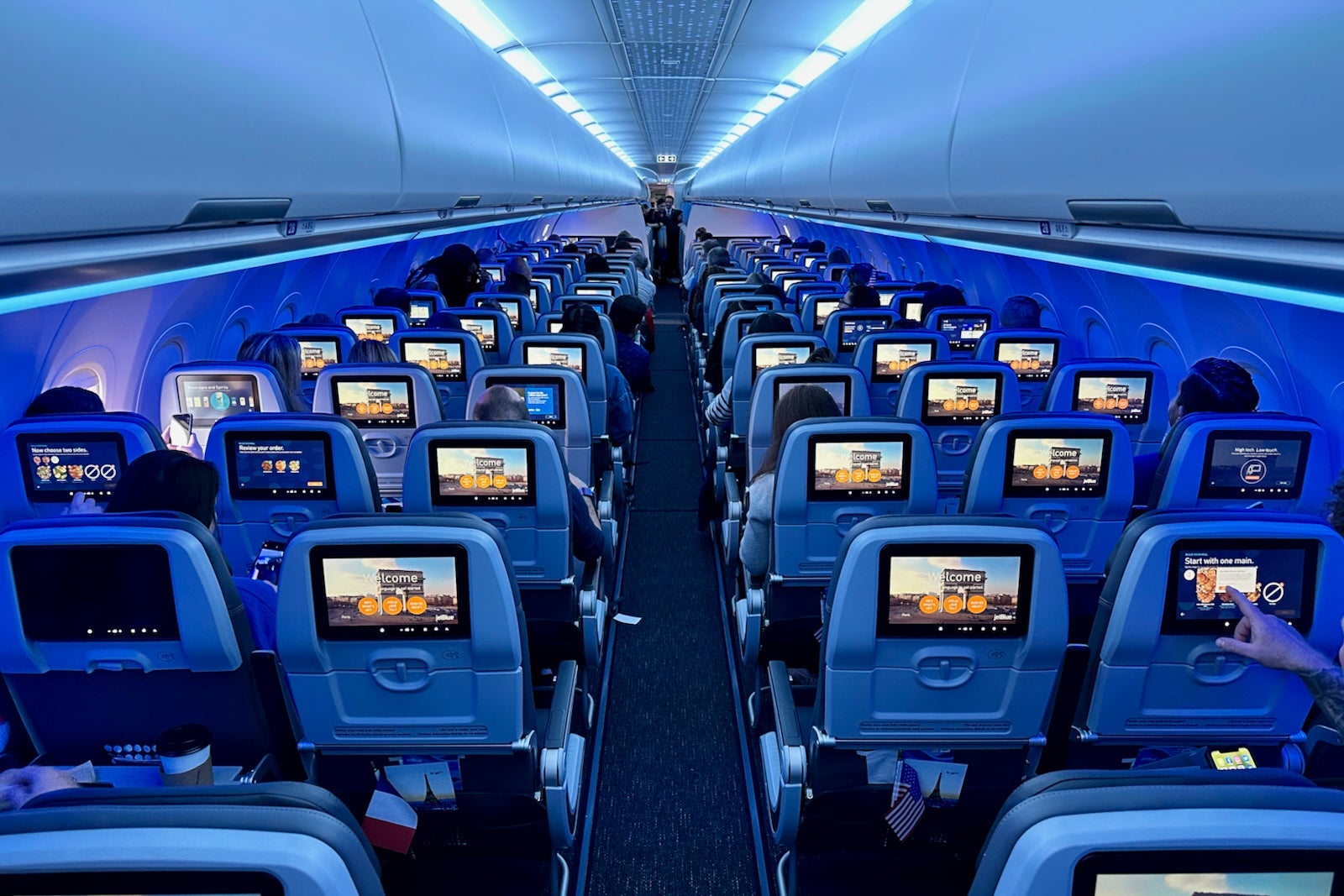 25 cities in 11 days: How this JetBlue flyer earned 350,000 points and 25 years of elite status JetBlue New York Paris Inaugural Airbus A321LR Mint 57