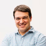 A headshot of TPG's Nick Ewen