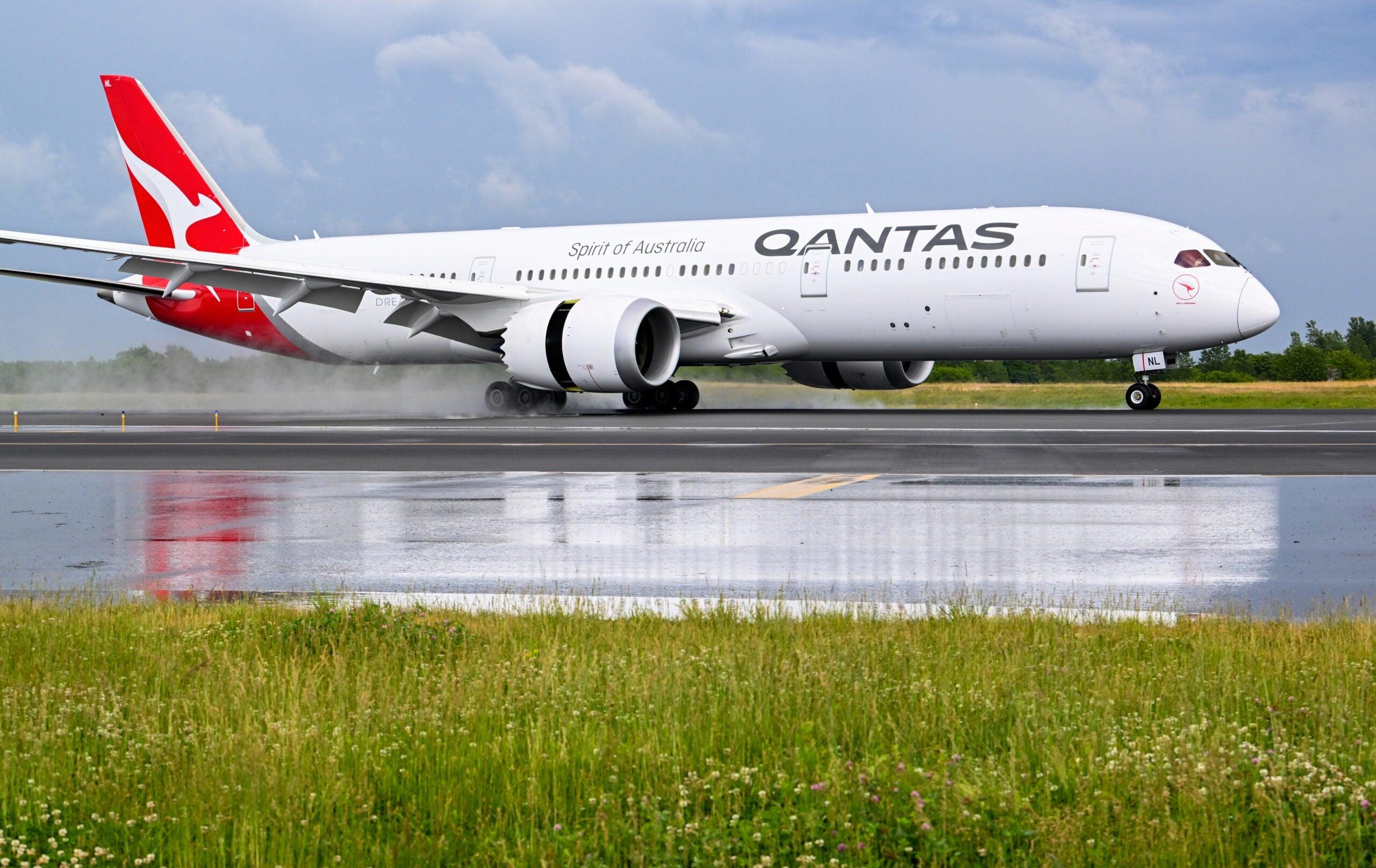 Qantas' inaugural flight arrives to New York.