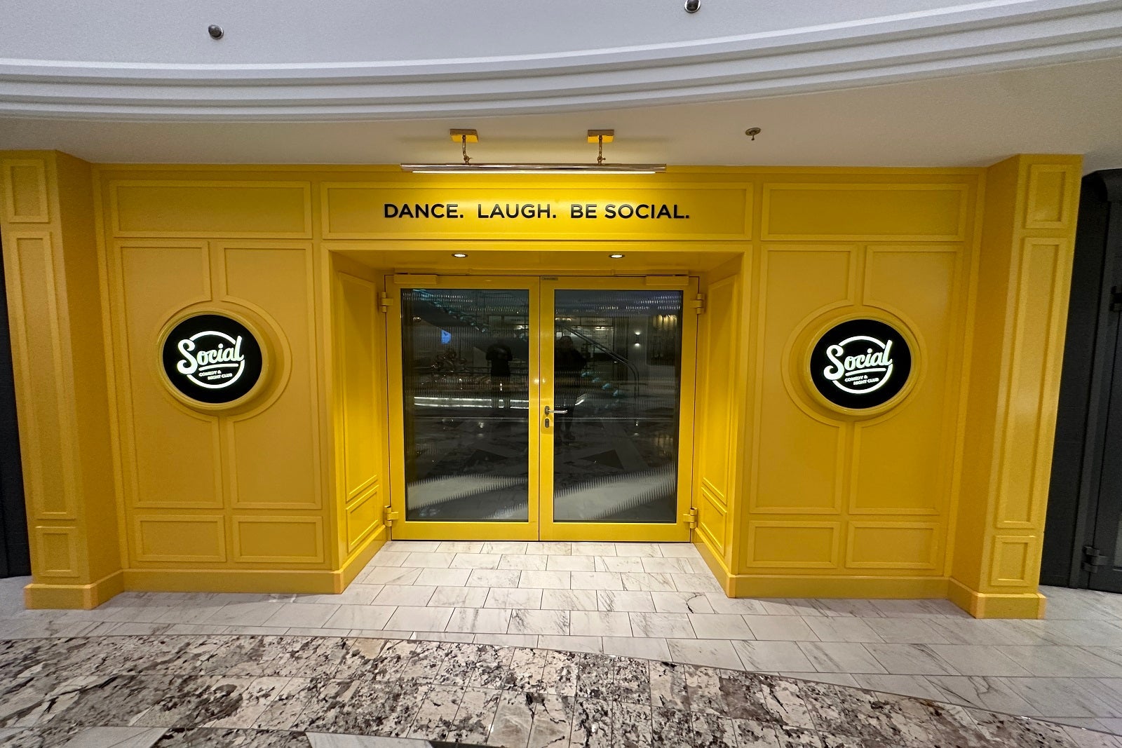 The outside of the comedy club on a cruise ship