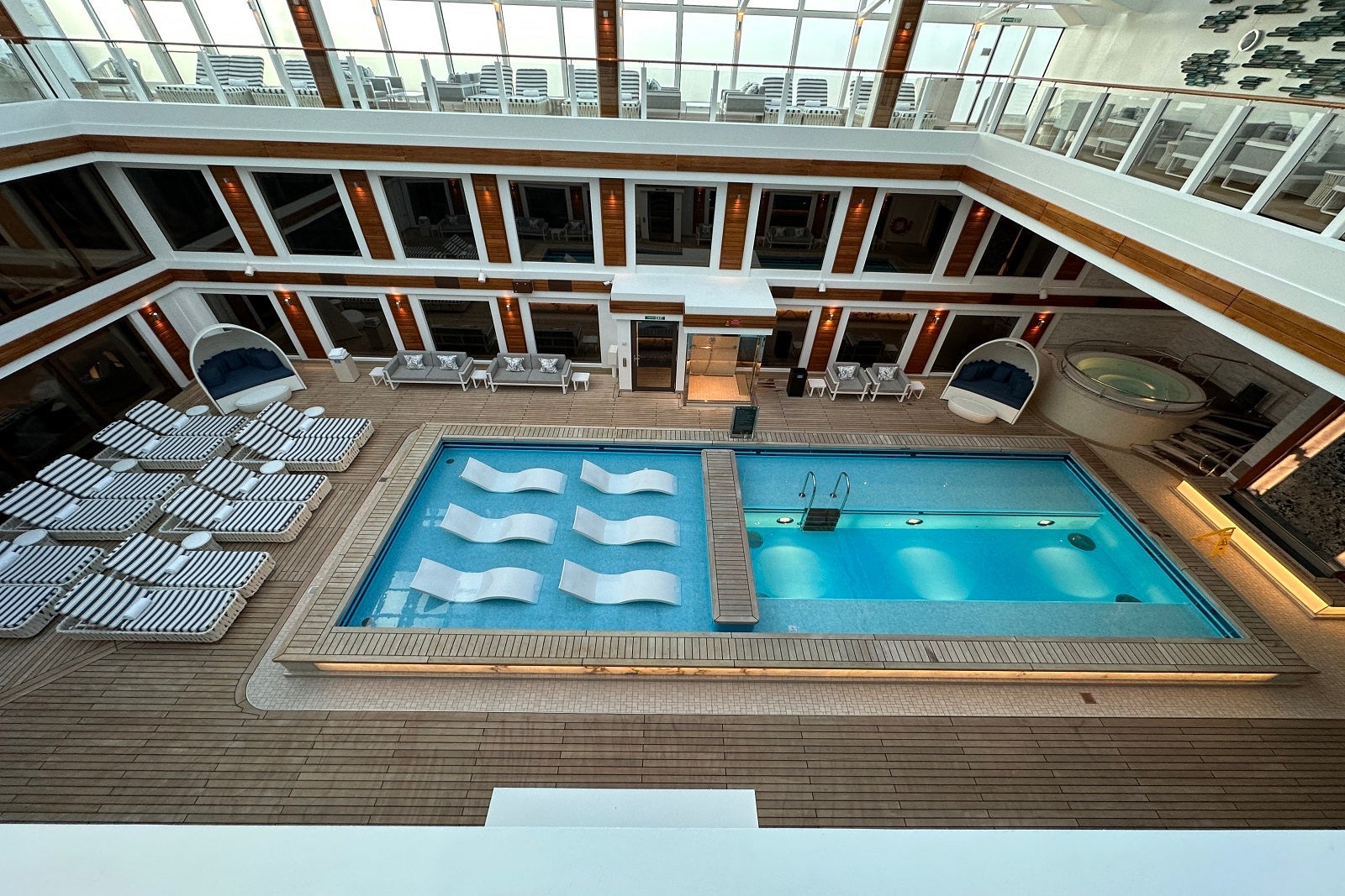 The private pool in The Haven suite enclave offers in-water loungers and a retractable roof.