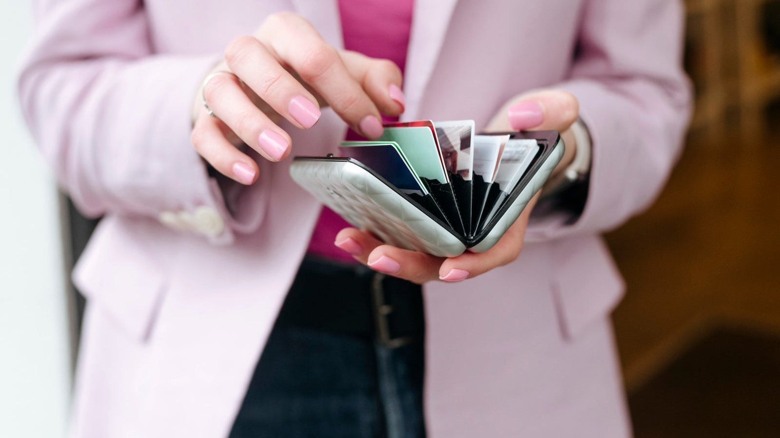 Woman's hands with cardholder