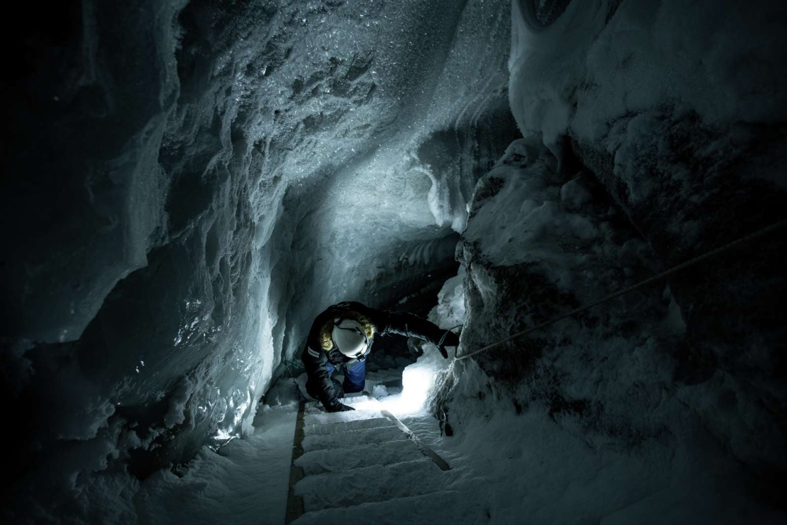 Descending into an ice cave in Svalbard Norway