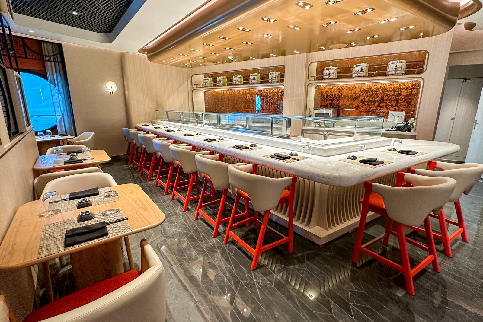 A sushi restaurant with counter seating