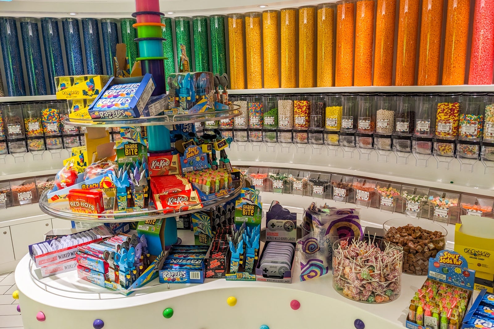 Cruise ship candy store with rainbow tubes of jelly beans