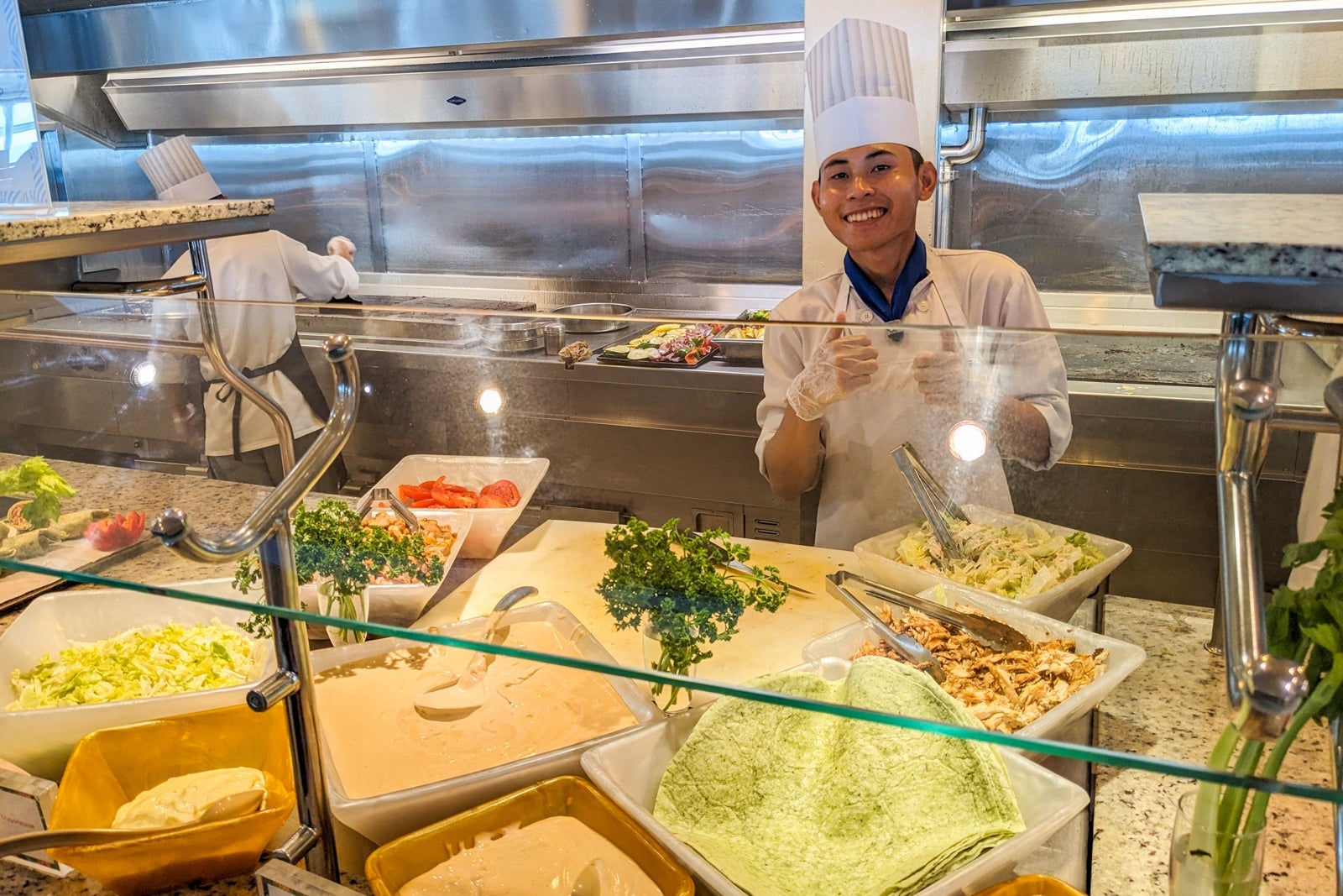 Smiling chef at cruise ship buffet
