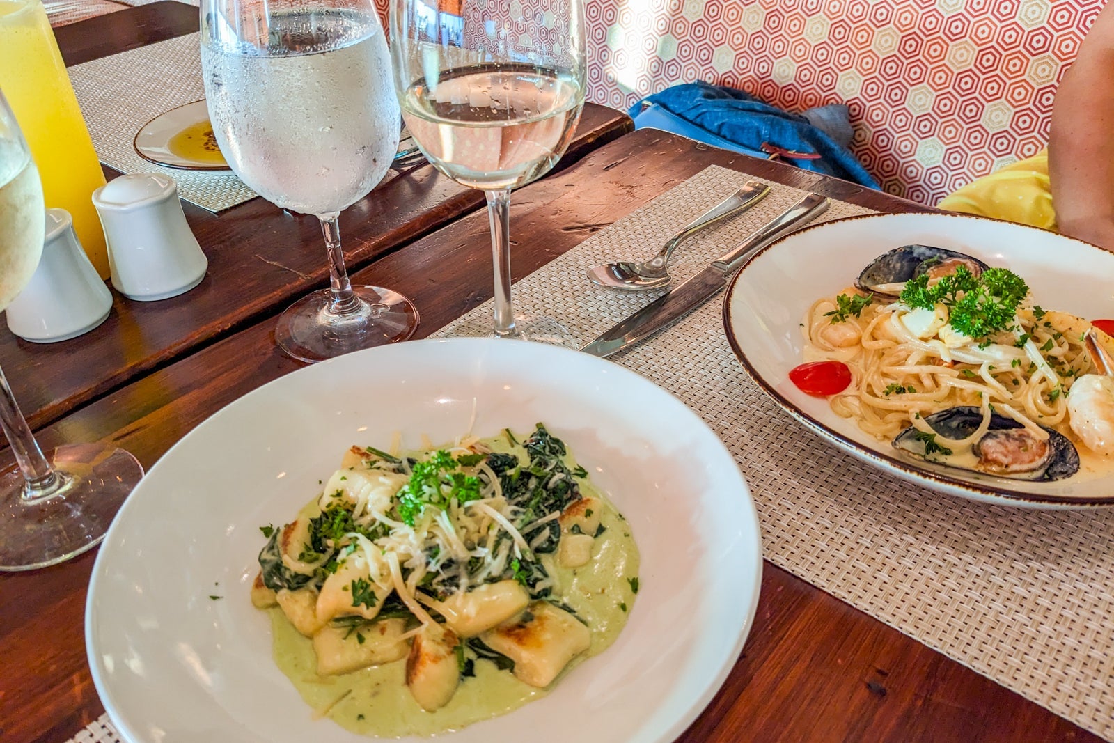 Gnocchi and glass of white wine