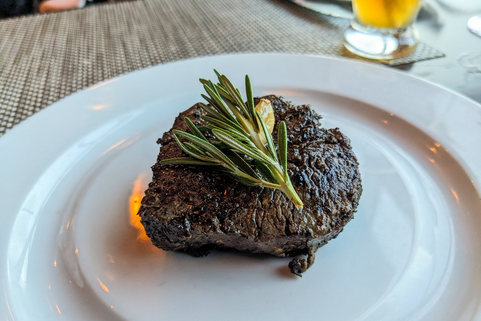 Filet mignon with sprig of rosemary