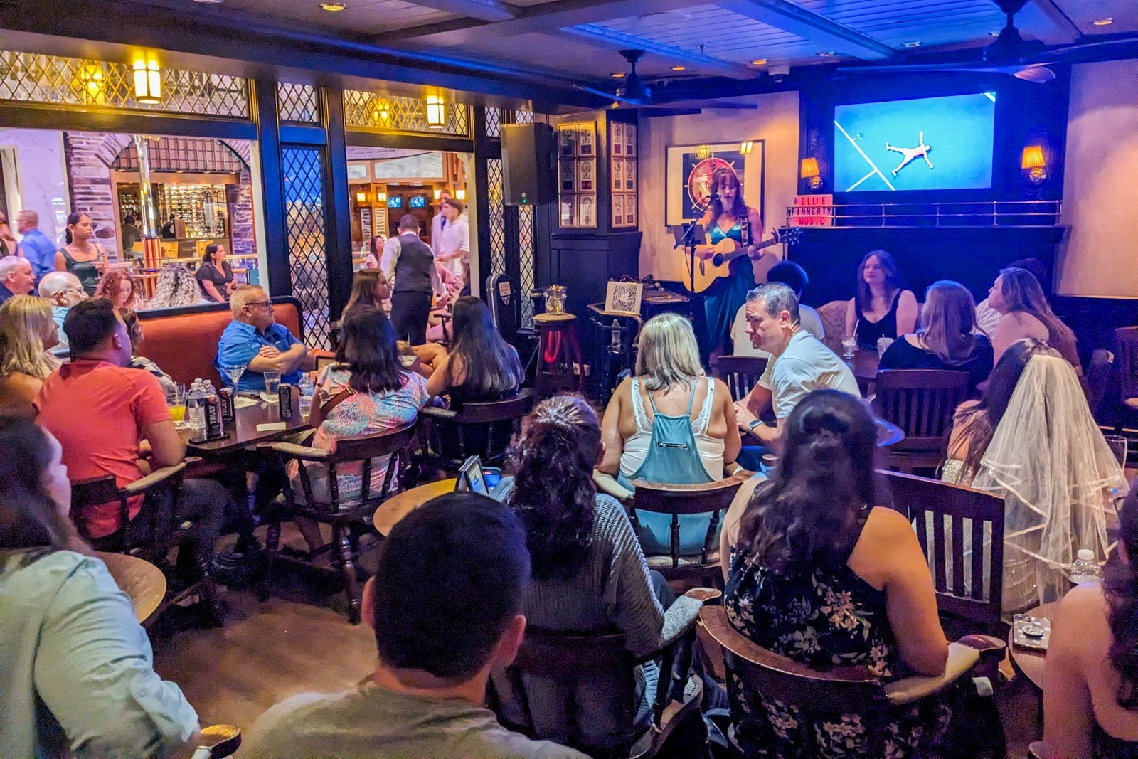 Guitarist performs at a cruise ship pub