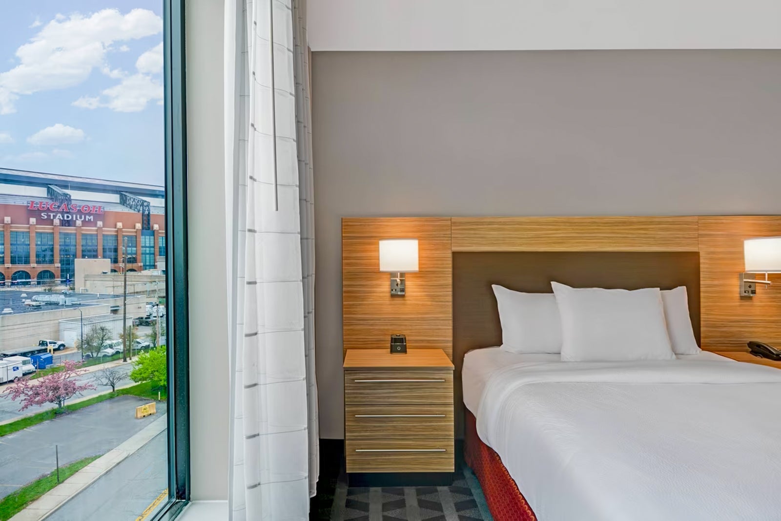 guest room with view of the Lucas Oil Stadium at Townplace Suites by Marriott Indianapolis Downtown