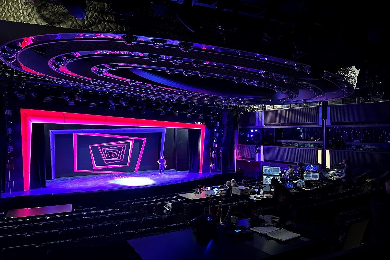 A cruise ship stage with the backdrop for Broadway show "Beetlejuice"