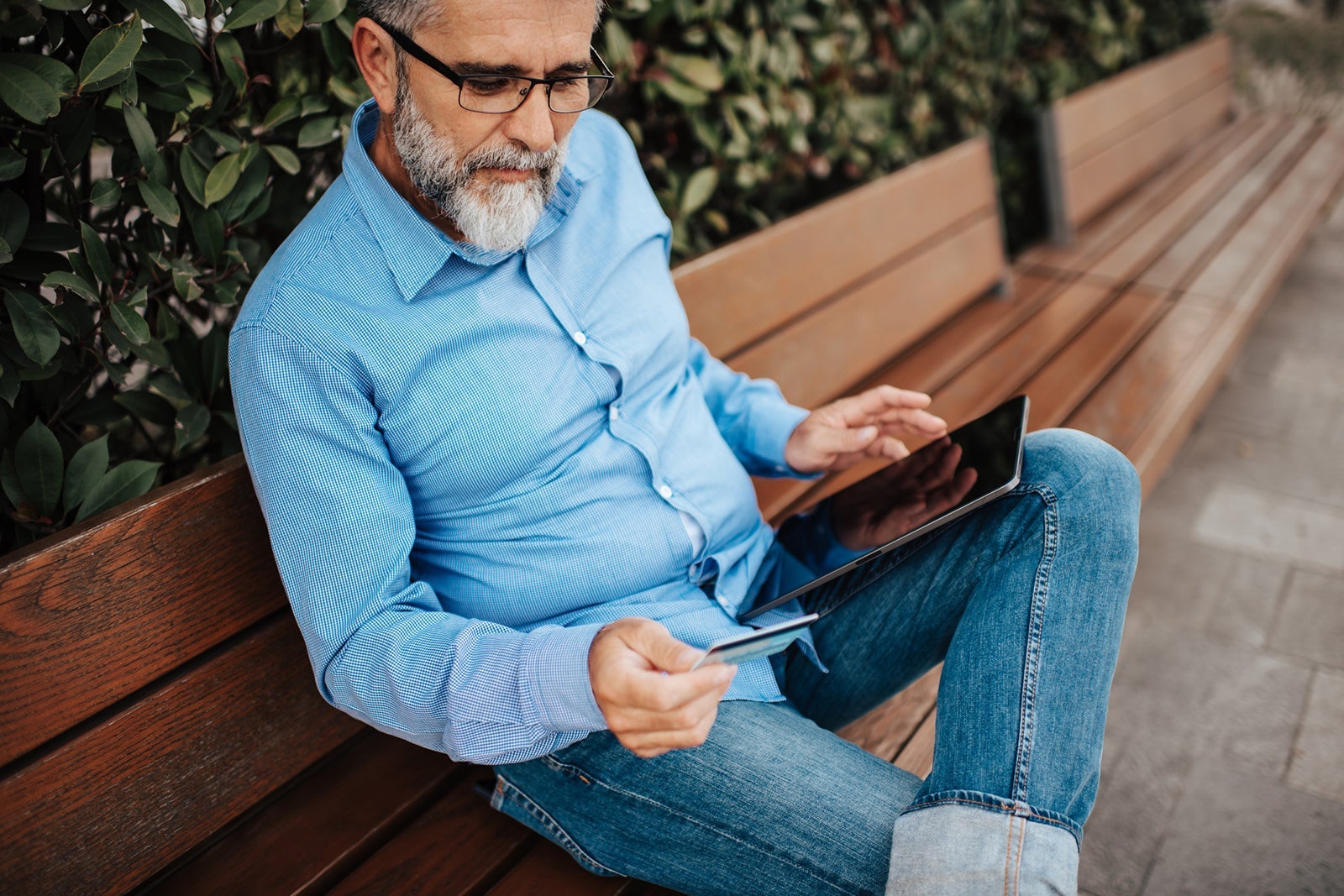 Senior man sitting on a bench