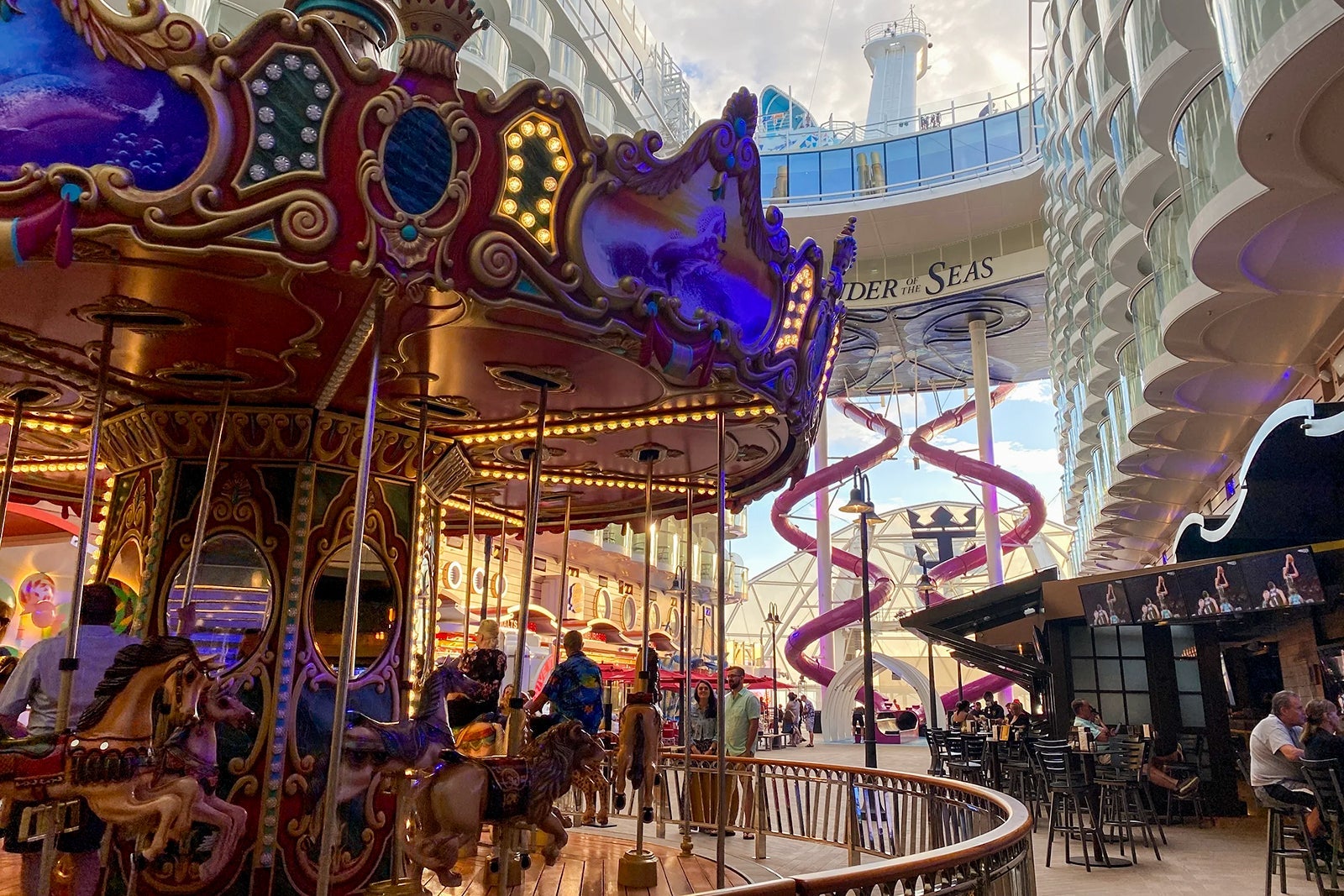 The carousel and dual Ultimate Abyss slides at The Boardwalk on Royal Caribbean's Wonder of the Seas