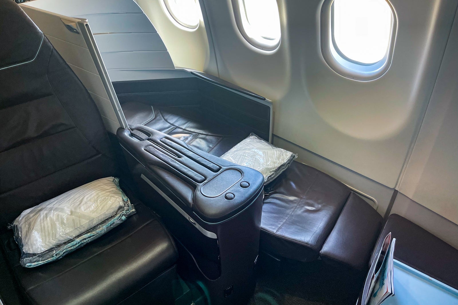 Fully reclined Hawaiian Airlines A330 first-class seat