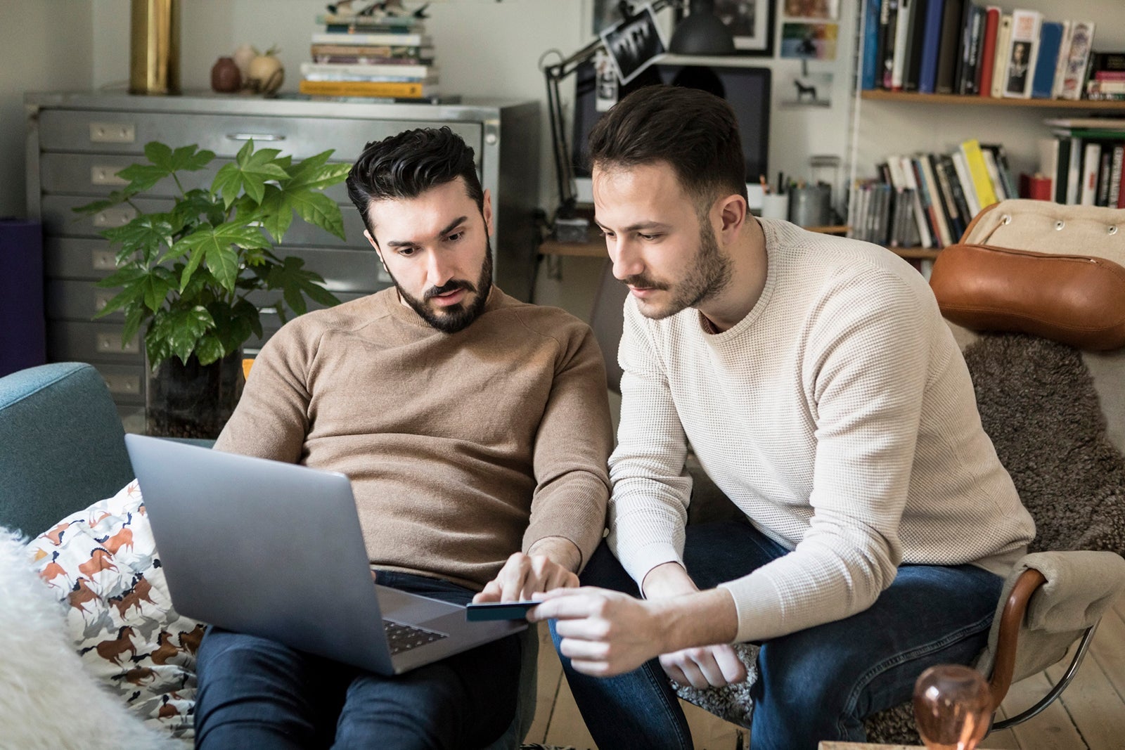 Couple looking at credit card