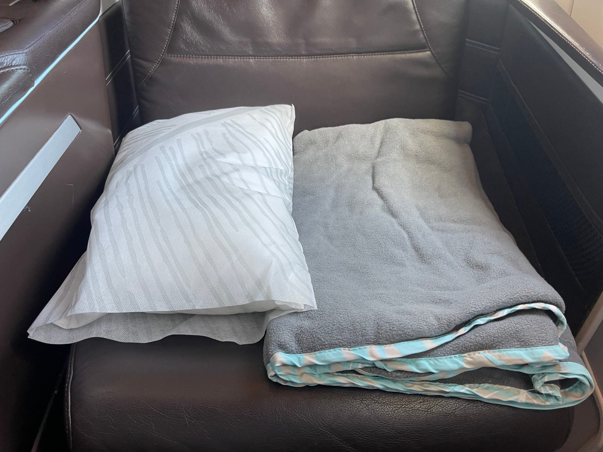 Hawaiian Airlines pillow and blanet first class