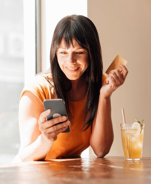 Woman holding a card