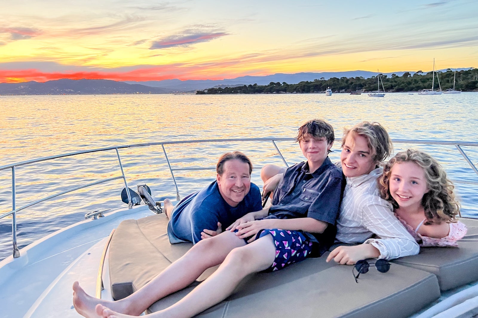 Eric Rosen's family enjoying a sunset cruise in the south of France