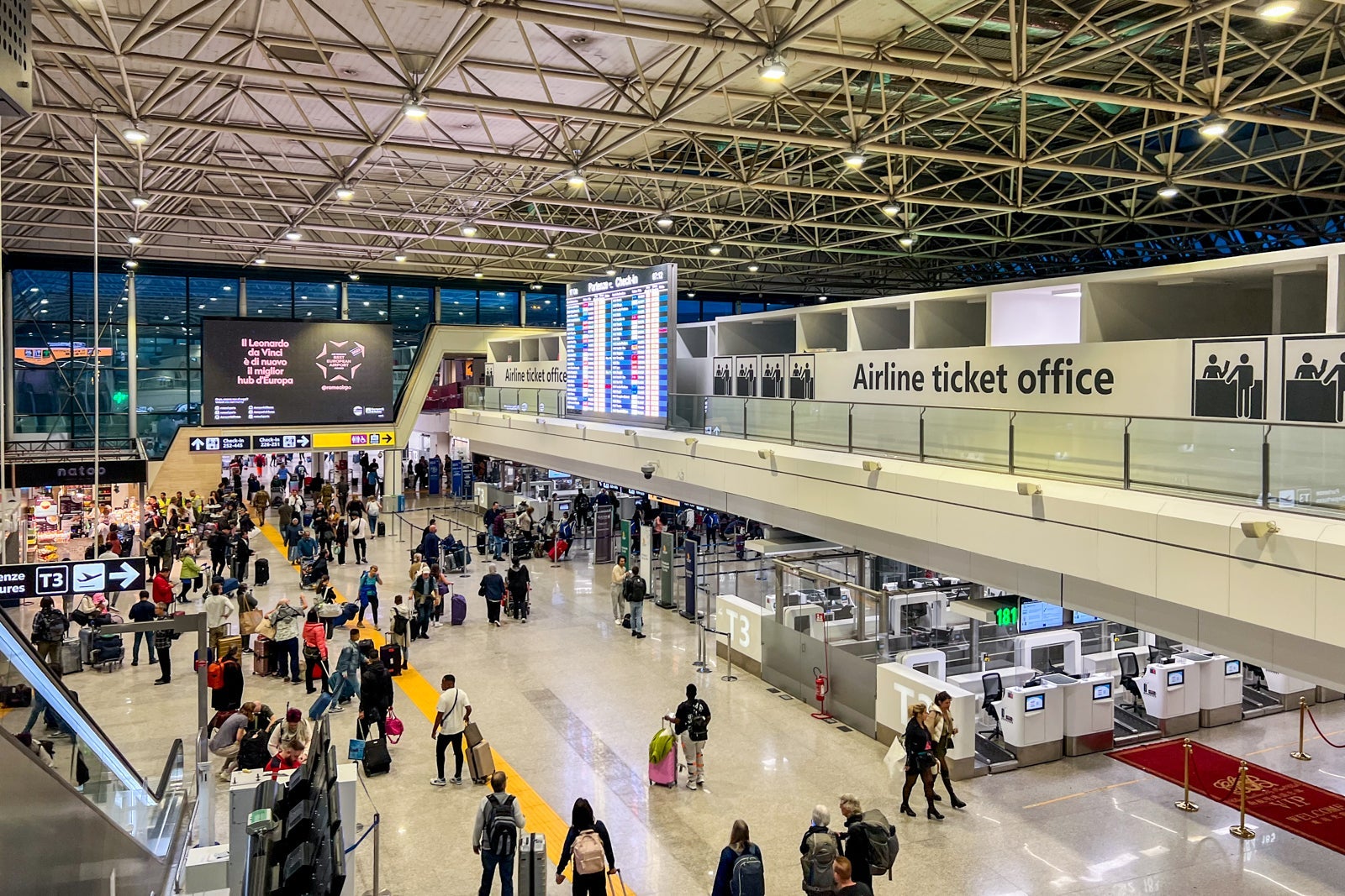 Busy Rome airport terminal