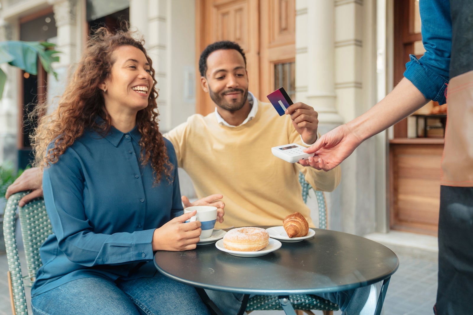 Couple dining at a cafe.