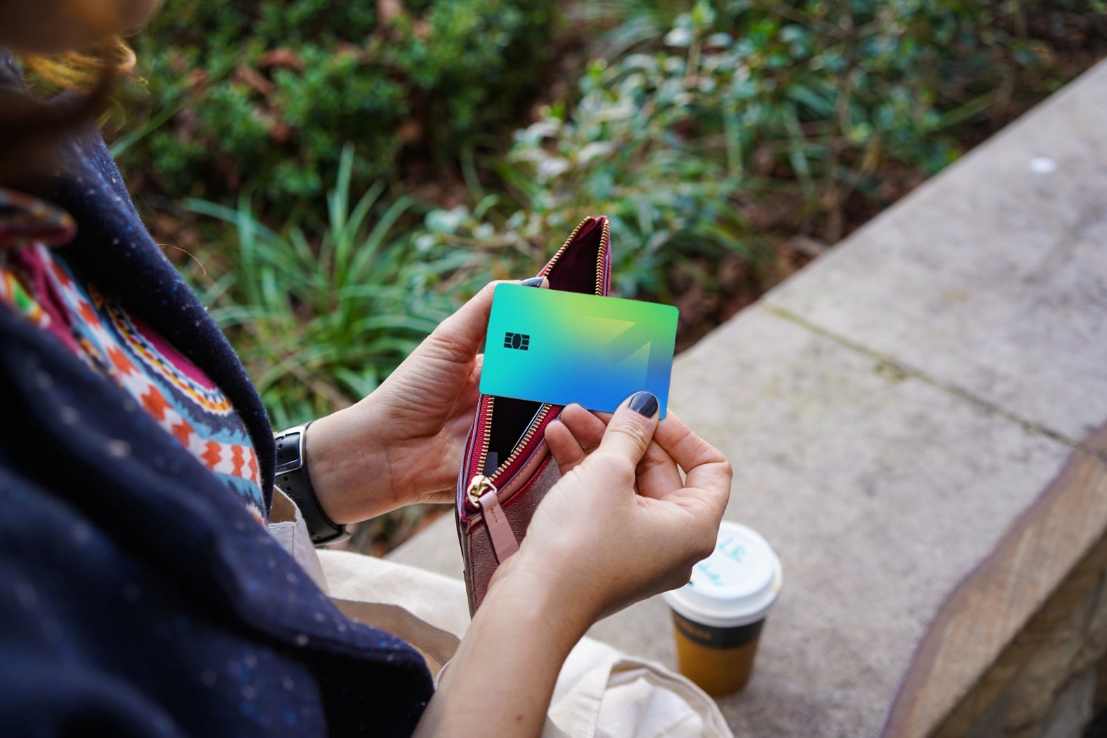 Person holding credit card