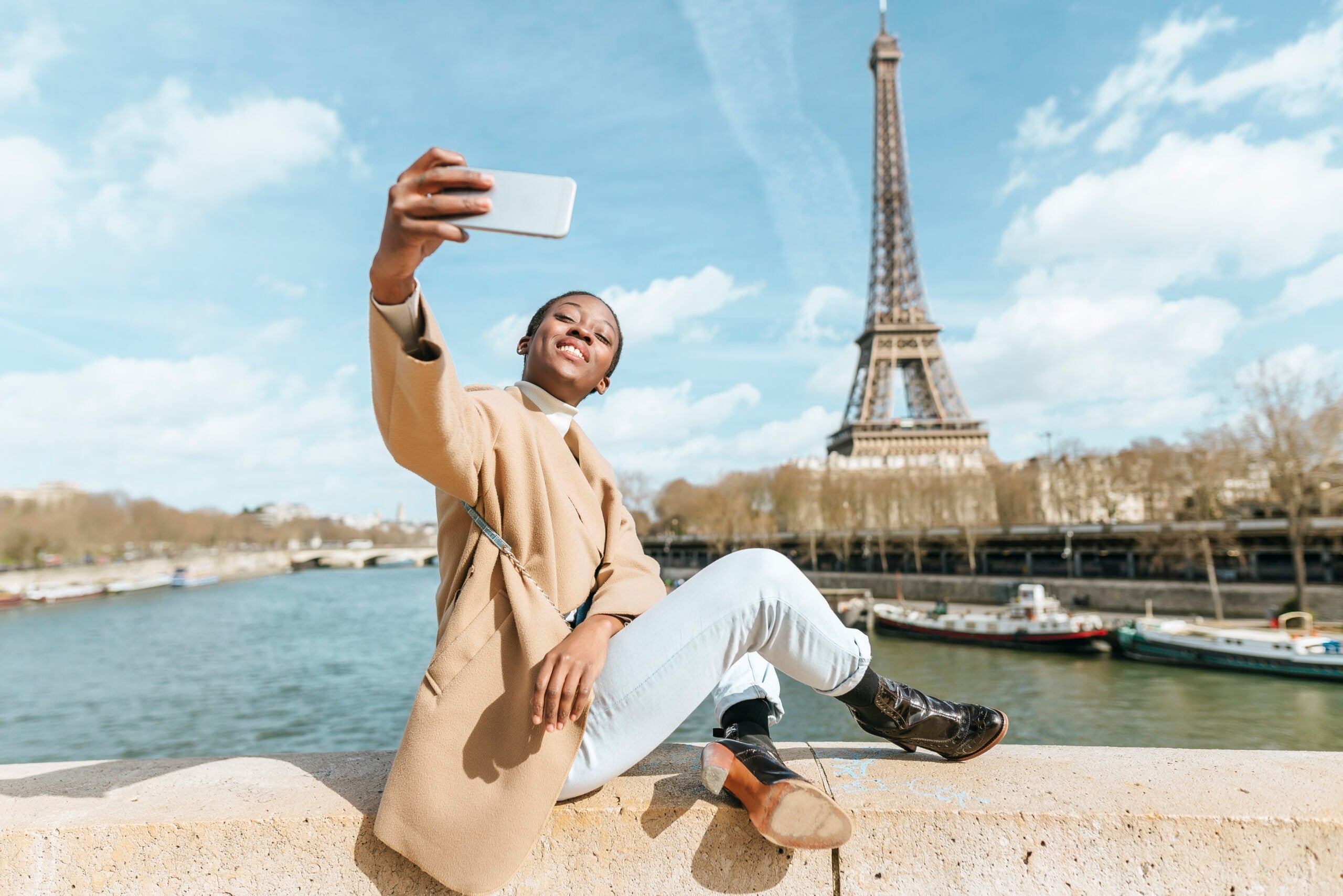 woman taking a selfie in paris