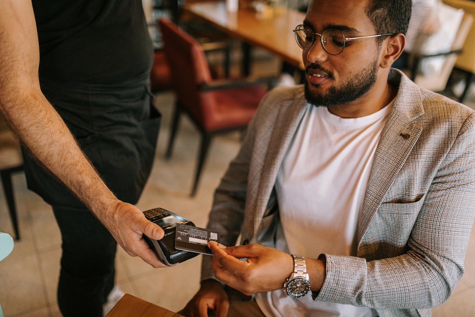 Man paying at restaurant