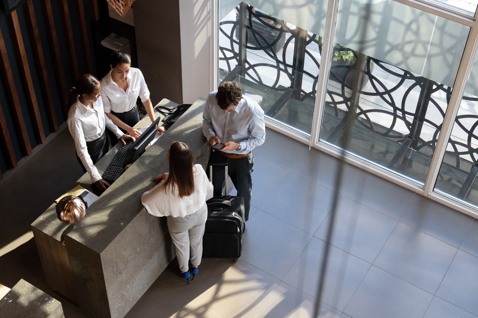People checking into hotel