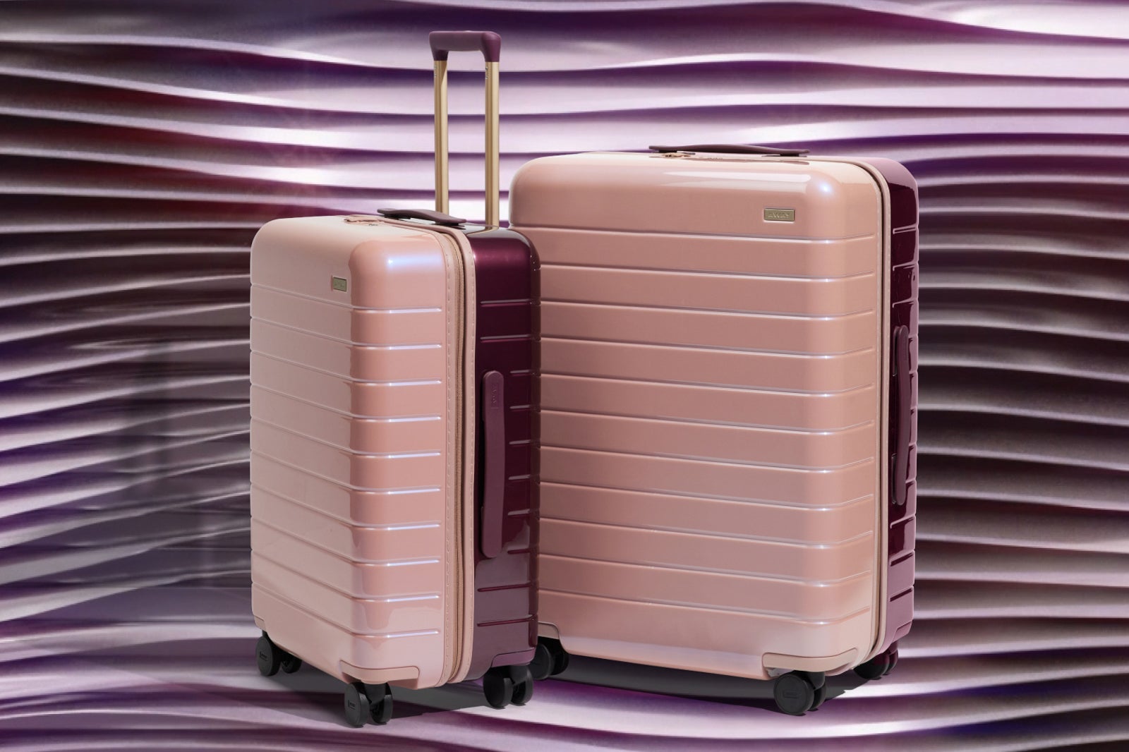 Holiday Magenta Collection hardshell luggage from Away