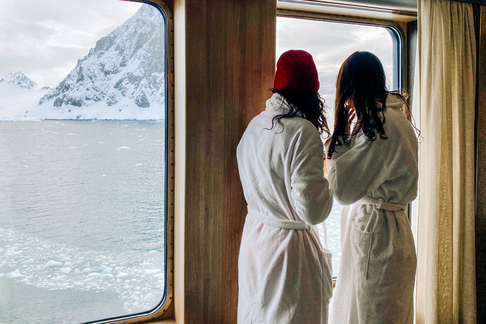Passengers wait in robes to take a polar plunge