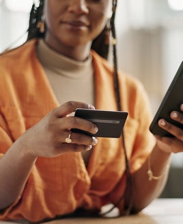 Woman using a card