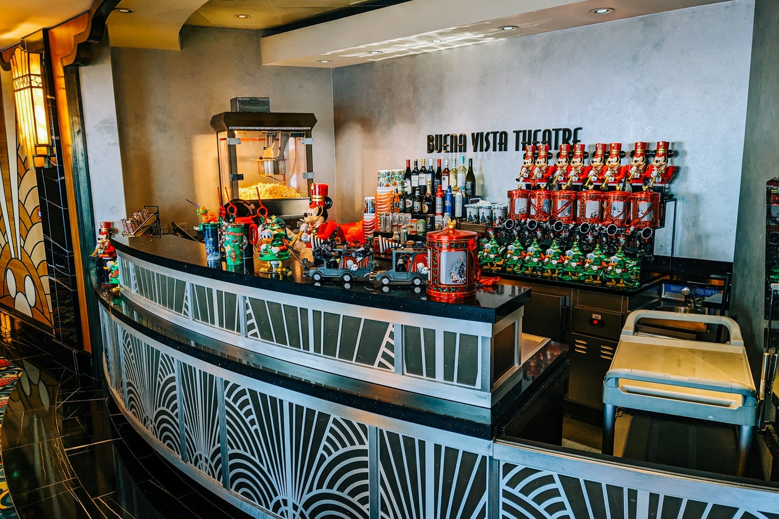 Counter with popcorn containers and alcohol