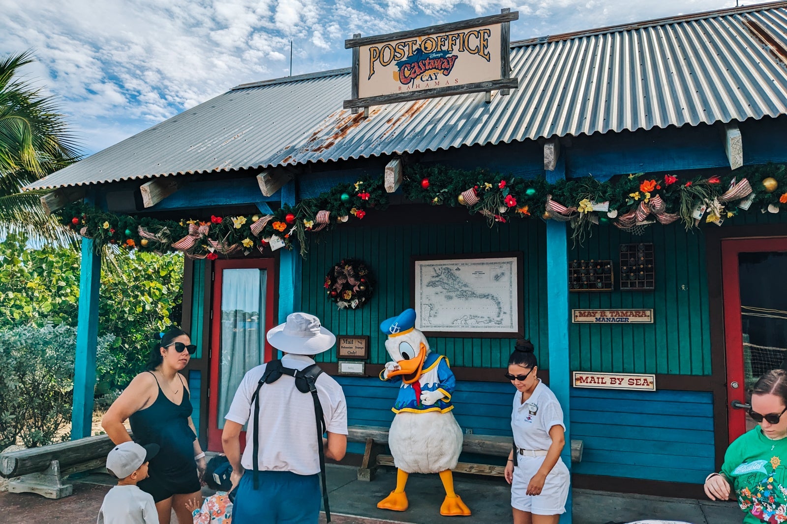 Donald Duck with photographer by island post office