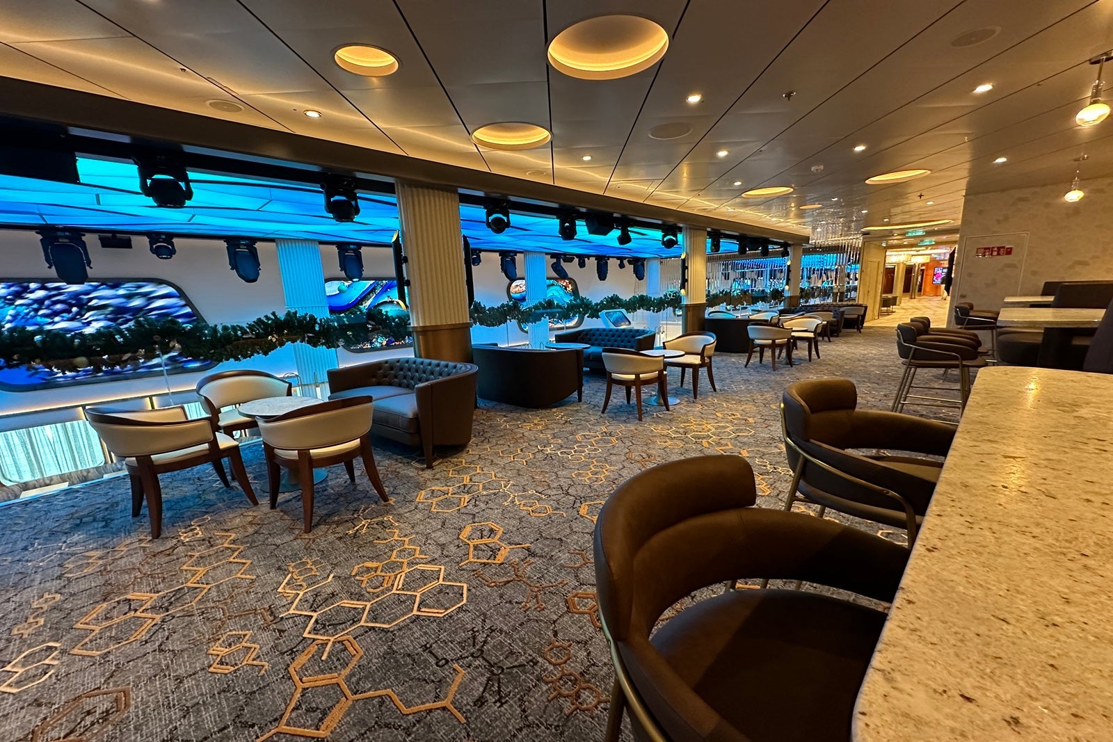 A seating area with tables and chairs