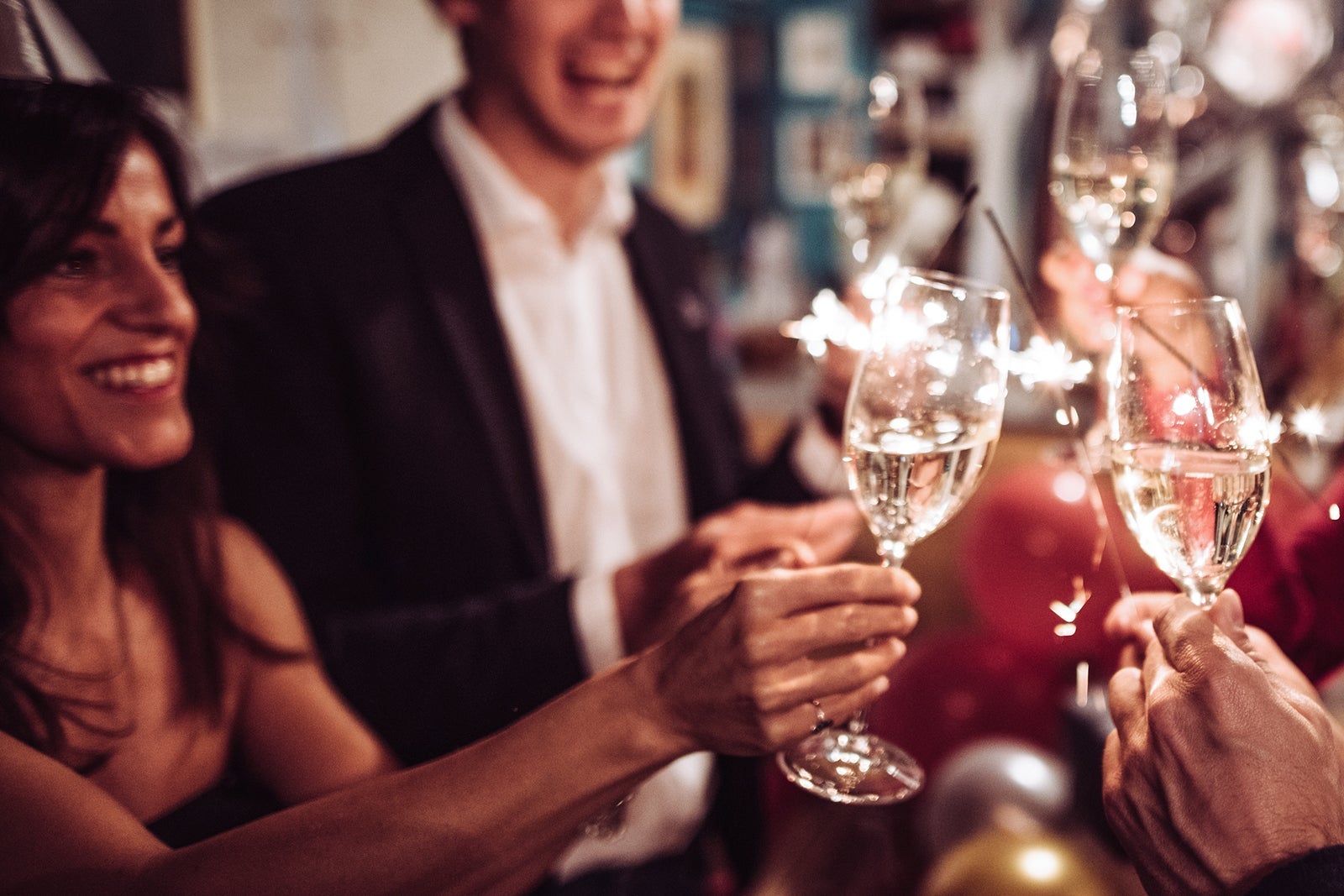 People toasting on New Year's Eve. 