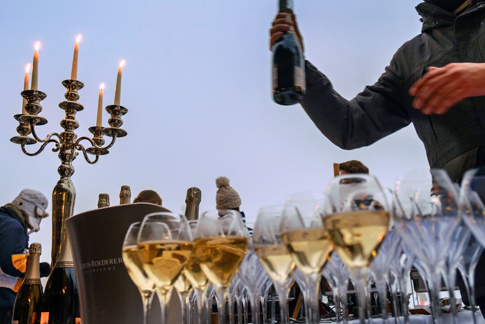 row of filled champagne glasses