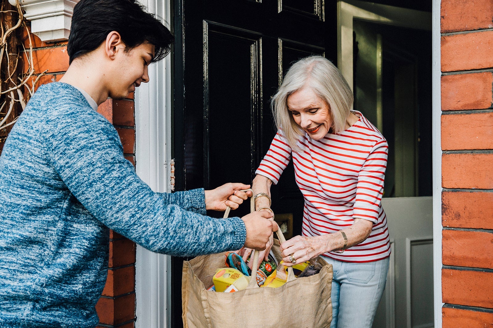Woman receiving groceries