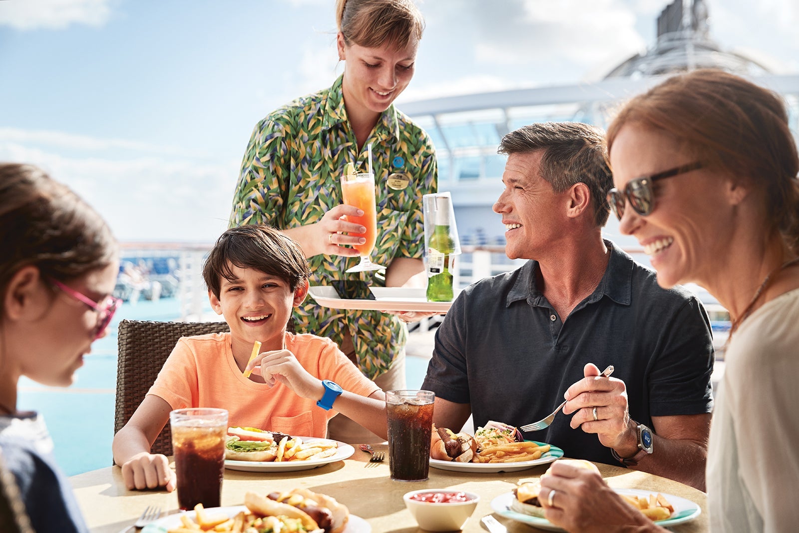 Family dining on the deck of a Princess cruise ship